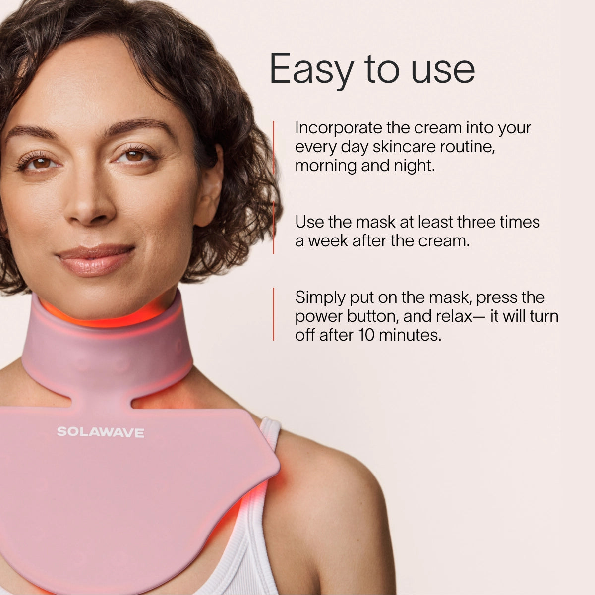 A person wearing a pink LED light therapy neck and chest mask. Text beside them reads: Solawave Neck & Chest LED Mask w/ LightBoost Cream Kit: Use the cream morning and night, then the mask 3 times a week. It turns off after 10 minutes for easy use.