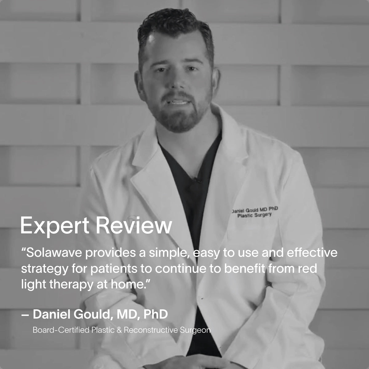 A board-certified plastic and reconstructive surgeon in a white coat is seated against a textured wall beside a quote about the Solawave Neck & Chest LED Mask w/ LightBoost Cream Kit. Benefits like Red Light Therapy are highlighted, and the grayscale image gives it a timeless appeal.