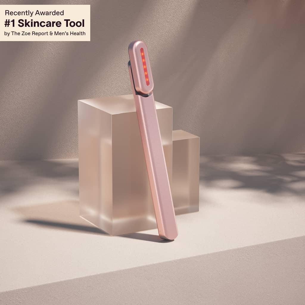 An image of the Solawave red light therapy wand in rose gold